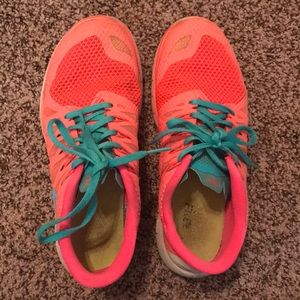 Pink/blue Nike Frees 5.0